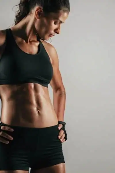 Toning Up at Home: The Ultimate Guide to Bodyweight Exercises 2 Image of woman's toned stomach after bodyweight exercises Redhill and non-surgical treatment from Lipo 360